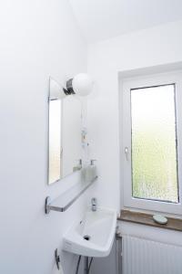 Koupelna v ubytování 2 Zimmer Ferienwohnung Am Hafen