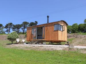 a tiny house sitting on top of a hill at Little Pip in Penzance