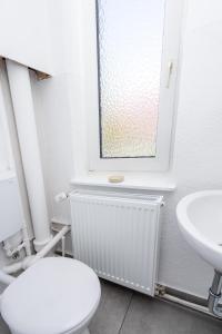 Koupelna v ubytování 2 Zimmer Ferienwohnung Am Hafen