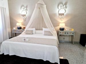 Cama o camas de una habitación en Hotel Plaza Del Castillo