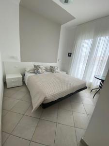Кровать или кровати в номере Residenza Viel