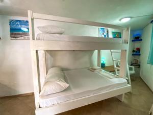 a couple of bunk beds in a room at Sea View Studio Armenistis Ikarias No2 in Armenistis