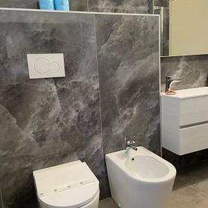 Koupelna v ubytování Hotel Helvetia