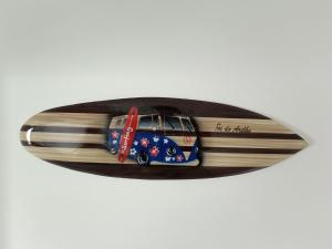 a wooden surfboard with a toy car on it at Gozo - new luxury villa with private pool in Foz do Arelho