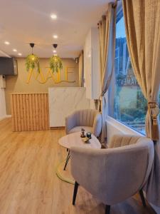 Posezení v ubytování Maile Apartamentos