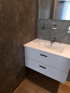 Kúpeľňa v ubytovaní Appart O'key