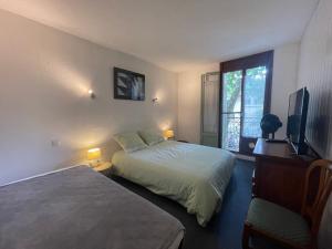 Postel nebo postele na pokoji v ubytování Residence Adele - Chambres d'Hôtes