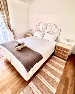 Postel nebo postele na pokoji v ubytování Conero casa- Marcelli di Numana in Via Litoranea 178 Fronte Mare con Pass Parcheggio Gratuito