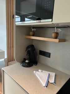 En TV eller et underholdningssystem på Apartment MAJA by Krone Travel Agency