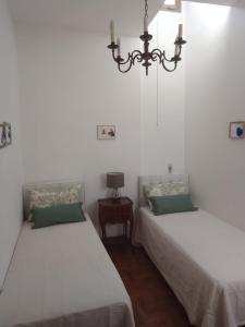 Cama o camas de una habitación en La Casina tra le Torri