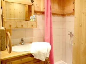 a bathroom with a tub and a sink and a shower at Studio Tignes, 1 pièce, 4 personnes - FR-1-502-353 in Tignes