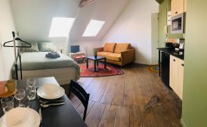 Kuchyňa alebo kuchynka v ubytovaní "Belle-vue" Cocon de charme