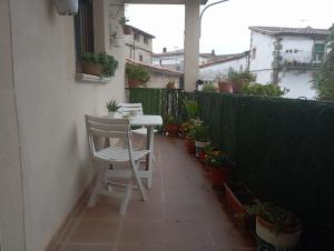 A balcony or terrace at Restaurante & Hotel Rural El Mirador de Trevejo,ideal para parejas