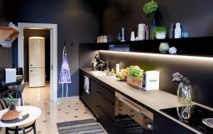 a kitchen with a sink and a counter top at Oberurseler in Kronberg im Taunus