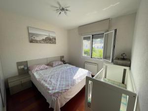 Posteľ alebo postele v izbe v ubytovaní Apartamento Céntrico en S'agaró + 13 fotografií
