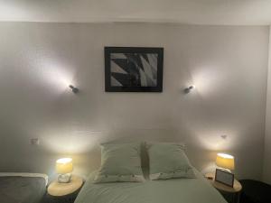 Postel nebo postele na pokoji v ubytování Residence Adele - Chambres d'Hôtes