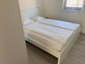 Voodi või voodid majutusasutuse Vitorlás Apartman toas