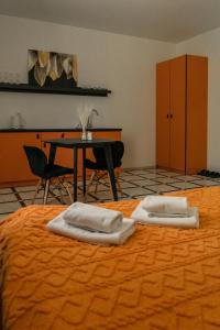 TREND HOUSE Apartments客房内的一张或多张床位