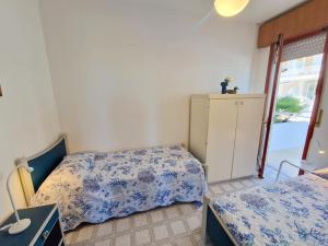 Postel nebo postele na pokoji v ubytování Tellina FronteMare