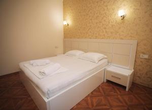 Postel nebo postele na pokoji v ubytování Hotel Irise