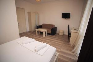 TV a/nebo společenská místnost v ubytování Hotel Irise