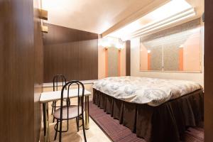 Voodi või voodid majutusasutuse リトルドルフィン岐阜 -大人専用- toas