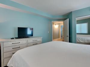 Una cama o camas en una habitación de Perdido Skye #46 12 fotos más