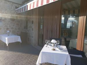 A restaurant or other place to eat at Restaurante & Hotel Rural El Mirador de Trevejo,ideal para parejas