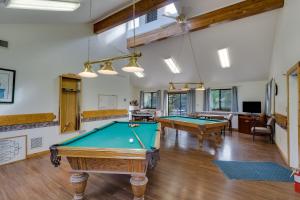 a living room with two pool tables in it at Thousand Trails Blue Mesa Recreational Ranch in Hierro