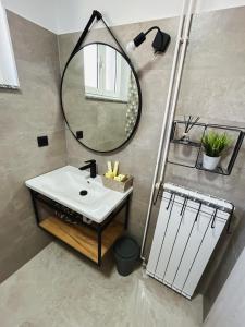 Kúpeľňa v ubytovaní Apartman Luma