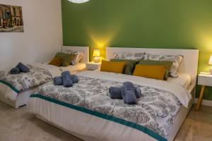 Posteľ alebo postele v izbe v ubytovaní Apartman Luma