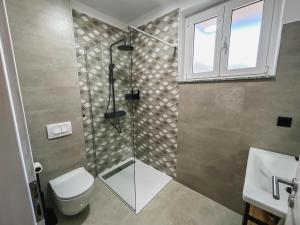Kúpeľňa v ubytovaní Apartman Luma