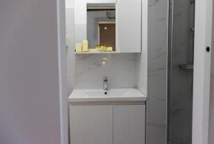 Kúpeľňa v ubytovaní Apartman Luma