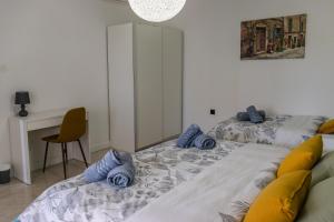 Posteľ alebo postele v izbe v ubytovaní Apartman Luma