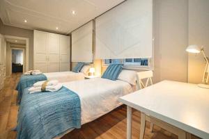 Postel nebo postele na pokoji v ubytování Begoña Apartamento