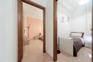 Кровать или кровати в номере Nina Home - Selfcheck-in