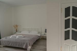 TREND HOUSE Apartments客房内的一张或多张床位