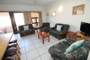 Posezení v ubytování Uvongo Cabanas 3B