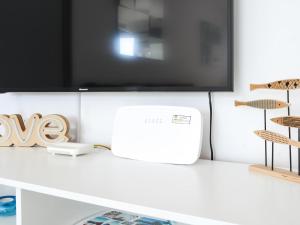 Telewizja i/lub zestaw kina domowego w obiekcie Payen Corralejo by Best Holidays Fuerteventura