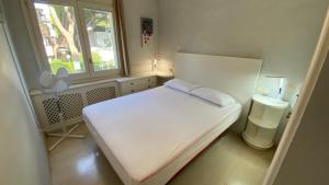 Postel nebo postele na pokoji v ubytování CASA ESLORA 26