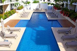 カンクンにあるNew Condo with Pool, Gym, A/C, WiFi, King Size bedのギャラリーの写真 +15枚の写真