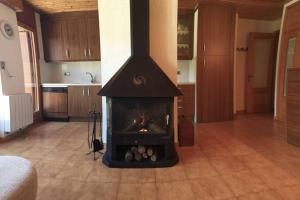 Kuchyňa alebo kuchynka v ubytovaní Apartamento con vistas Taull + 11 fotografií