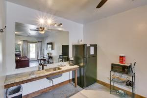 a kitchen with a sink and a refrigerator at Lava Hot Springs Studio with Views - Walk to River in Lava Hot Springs