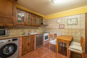 Kuchyň nebo kuchyňský kout v ubytování Villa Las Ardillas