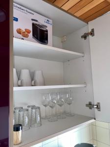 Kuchyň nebo kuchyňský kout v ubytování 2- Zimmer Wohnung + 5 fotografií