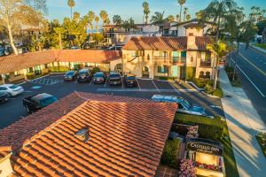 an aerial view of a town with cars parked in a parking lot at Castillo Inn at the Beach in Santa Barbara