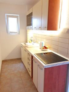 Kuchyň nebo kuchyňský kout v ubytování Apartments Selleng