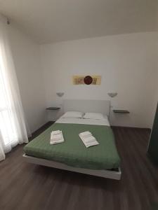 Postel nebo postele na pokoji v ubytování La Llua Alghero