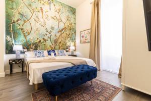 Säng eller sängar i ett rum på Casa Palacio Rufina & Jardines