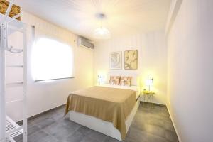 Łóżko lub łóżka w pokoju w obiekcie Belgica 2 - 2 room city & beach by 10ToSea